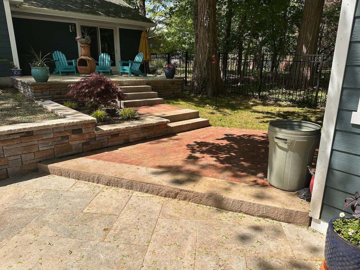 Multi-level patio and brick landing area at Ridgewood custom home by Fairmount Heights Homes.