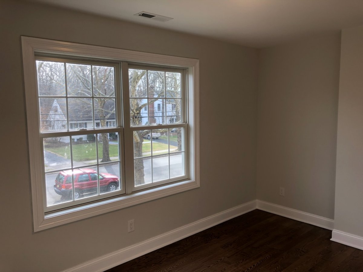 Bedroom window view of neighborhood street in Ridgewood home by Fairmount Heights Homes.