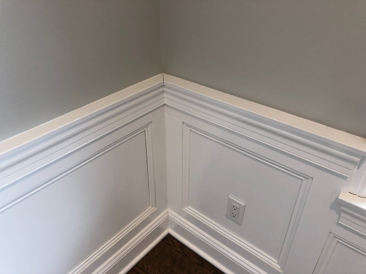 Close-up of corner wainscoting and outlet detail in a Ridgewood, NJ custom home by Fairmount Heights Homes.
