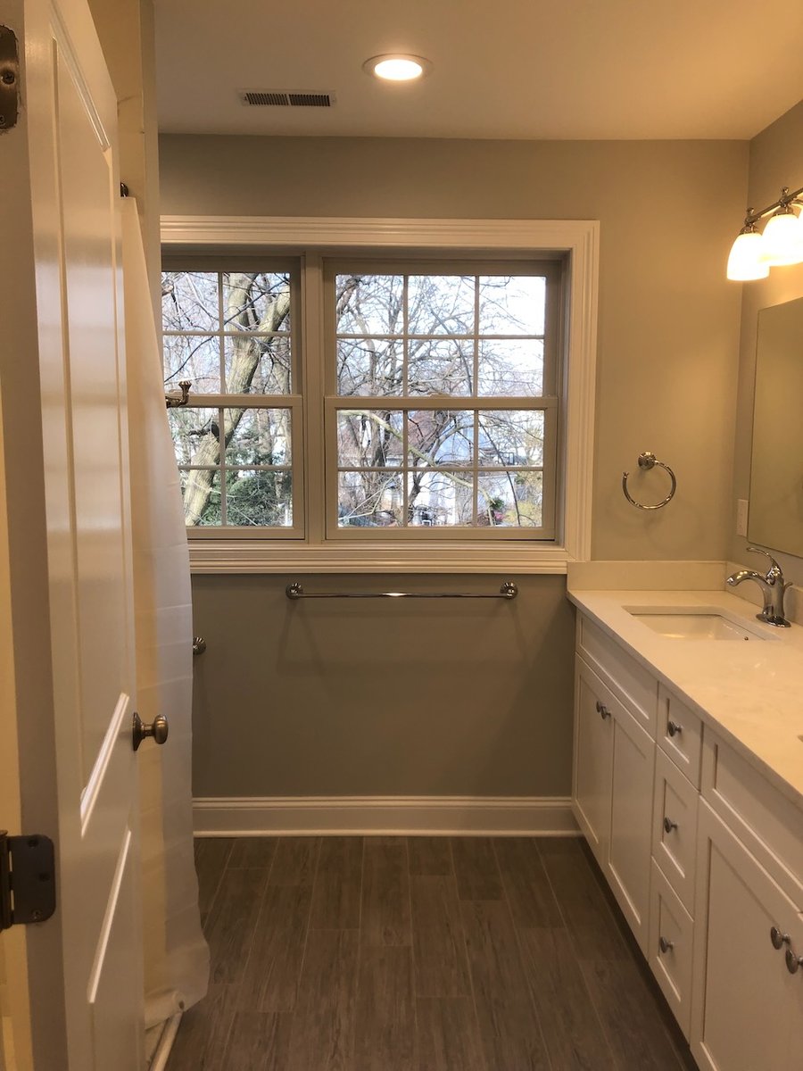 Elegant bathroom vanity with double sinks in Ridgewood, NJ custom home by Fairmount Heights Homes.