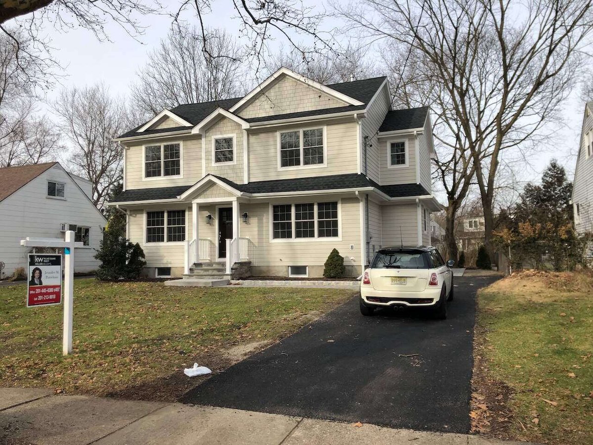 Front exterior of custom two-story home in Ridgewood, NJ built by Fairmount Heights Homes.
