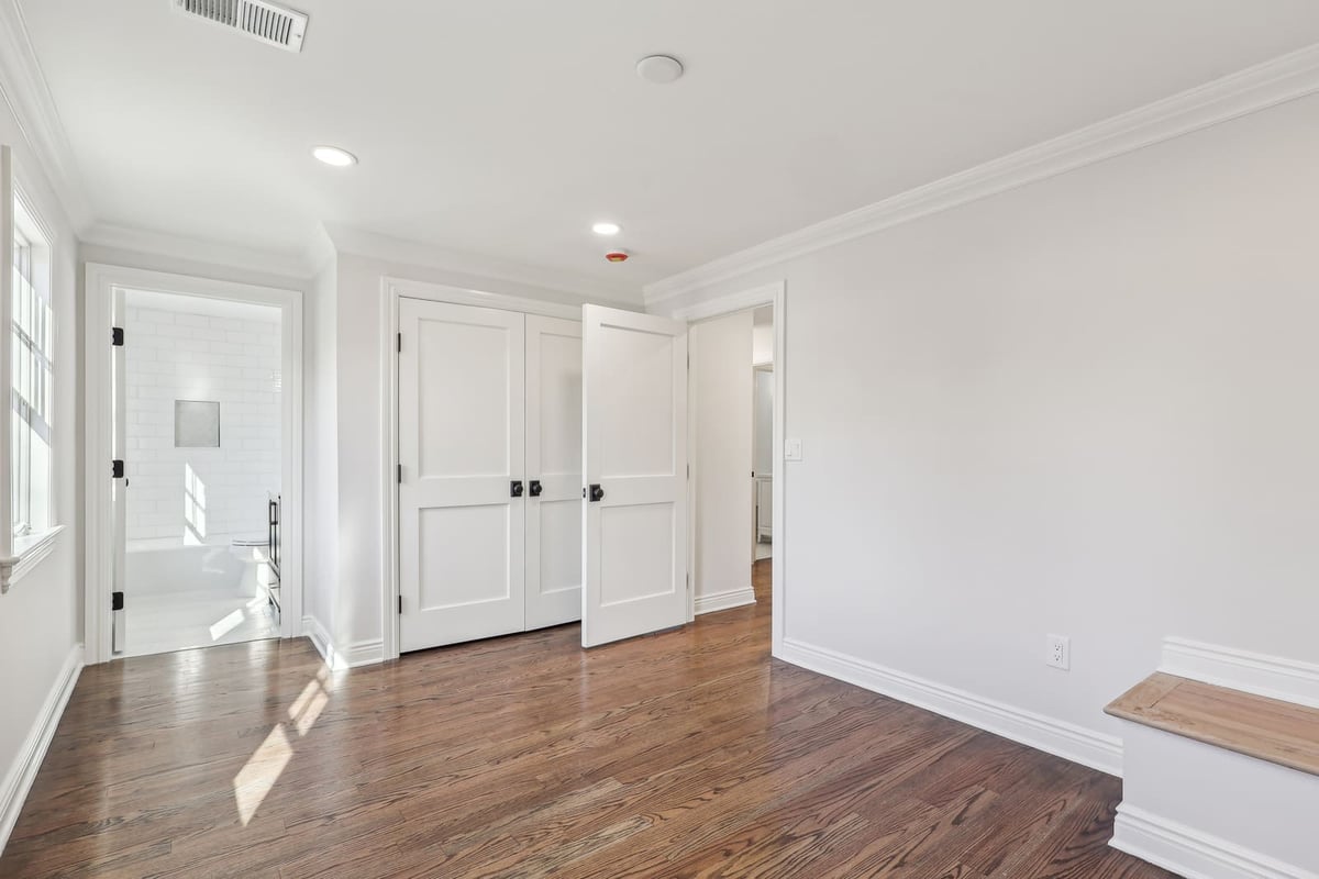 Bedroom in Ridgewood, NJ with double closets and adjoining bath