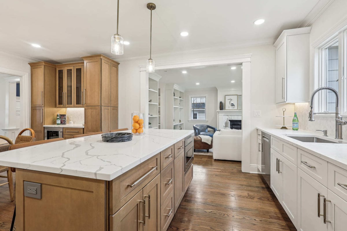 Ridgewood, NJ kitchen with quartz island, pendant lights, and custom cabinetry